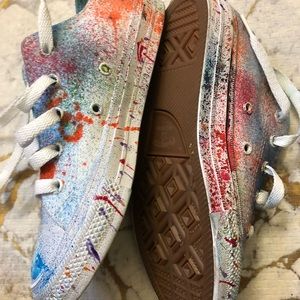 This are new custom converse Chuck Taylors multi colored one of a kind .